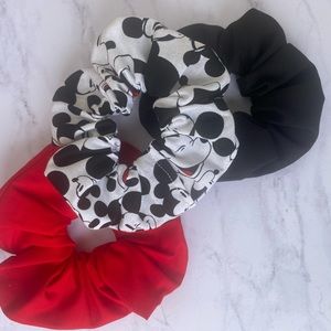 This is our handmade mickey mouse 3 piece scrunchie set.